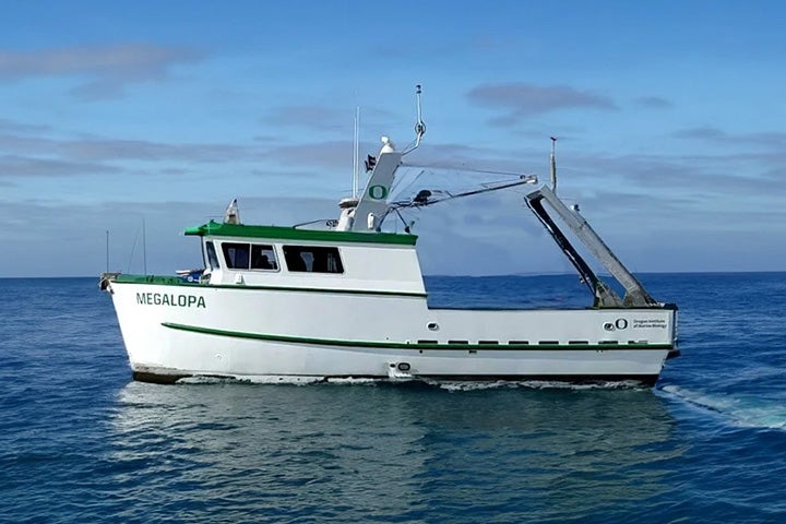 Boat named Megalopa for the Oregon Institute of Marine Biology floating in water